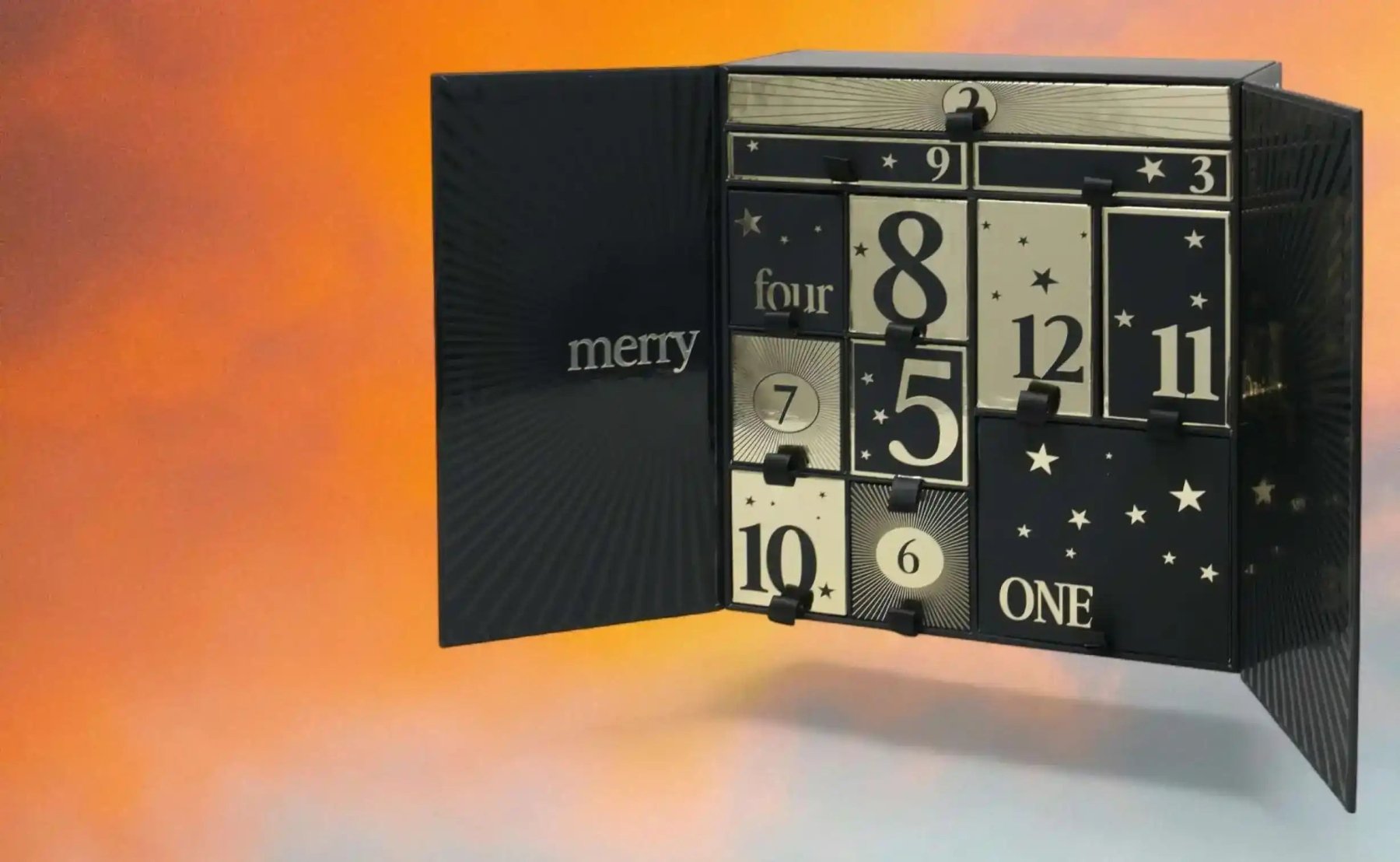 Luxury AEMBR Advent Calendar 2025 with festive compartments and elegant design for holiday countdowns.