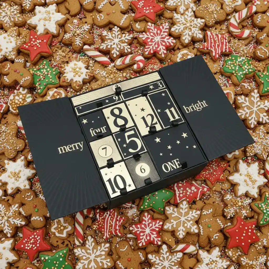 Luxury Advent Calendar 2025 by AEMBR featuring festive compartments and elegant design for holiday countdowns.