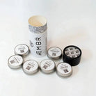 AEMBR Discovery Set of candles with various scents, arranged in a sleek box, featuring minimalist packaging and elegant design.