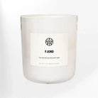 AEMBR Fjord Candle with a sleek, modern design, showcasing a tall, elegant candle in a minimalist holder.