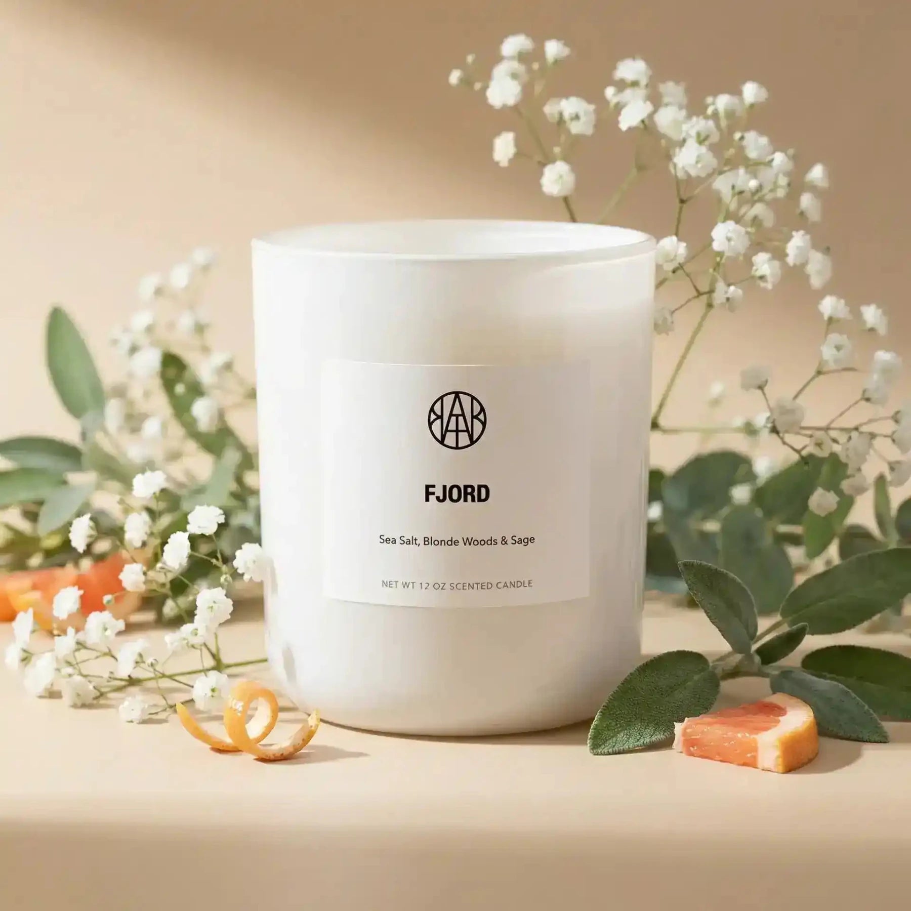 AEMBR Fjord Candle with a sleek glass container and minimalist design, ideal for creating a cozy ambiance in any space.