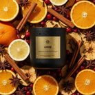 AEMBR Hygge Candle displayed with a warm, flickering flame in a cozy setting, perfect for creating a relaxing ambiance.