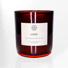 AEMBR Leaves Candle featuring a natural leaf design, perfect for cozy home decor and ambient lighting.