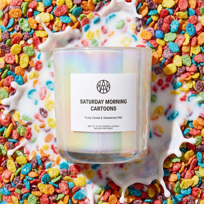 AEMBR Saturday Morning Cartoons Candle featuring colorful, nostalgic cartoon-inspired design in a glass candle holder.