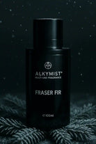 AEMBR Christmas Tree Bundle with Fraser Fir Alkymist candle and Viking Candle, featuring festive holiday-themed candle packaging and designs.