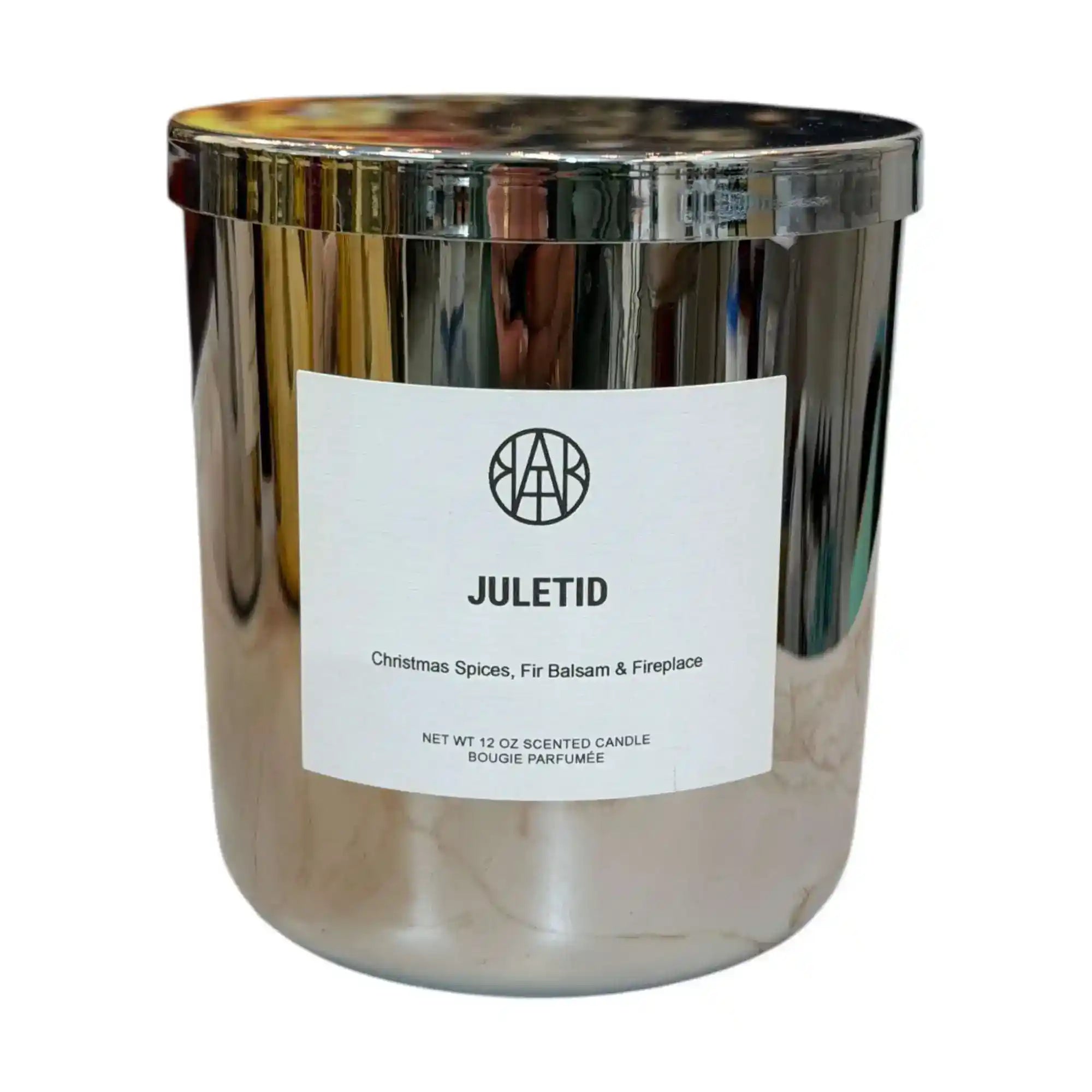 Non-toxic JULETID scented candle in metallic silver jar, Christmas spices and fir fragrance.
