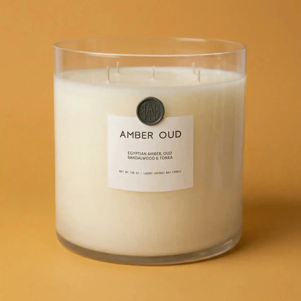 AEMBR The Valkyrie Amber Oud candle with powdery amber and oud scent, featuring a sleek, elegant candle design.