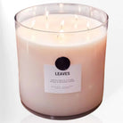 AEMBR The Valkyrie Leaves candle featuring a decorative candle with leaf patterns on a white surface.