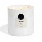 AEMBR The Viking Fraser Fir candle with Balsam, Frankincense, and Myrrh scent, featuring a decorative candle with natural greenery.