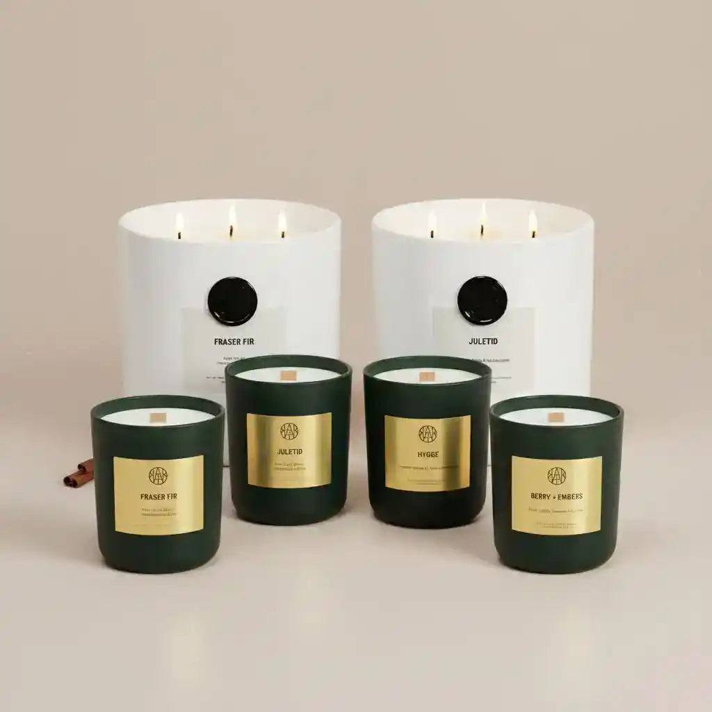 Winter non-toxic candles in white and green jars with gold labels, natural home fragrance