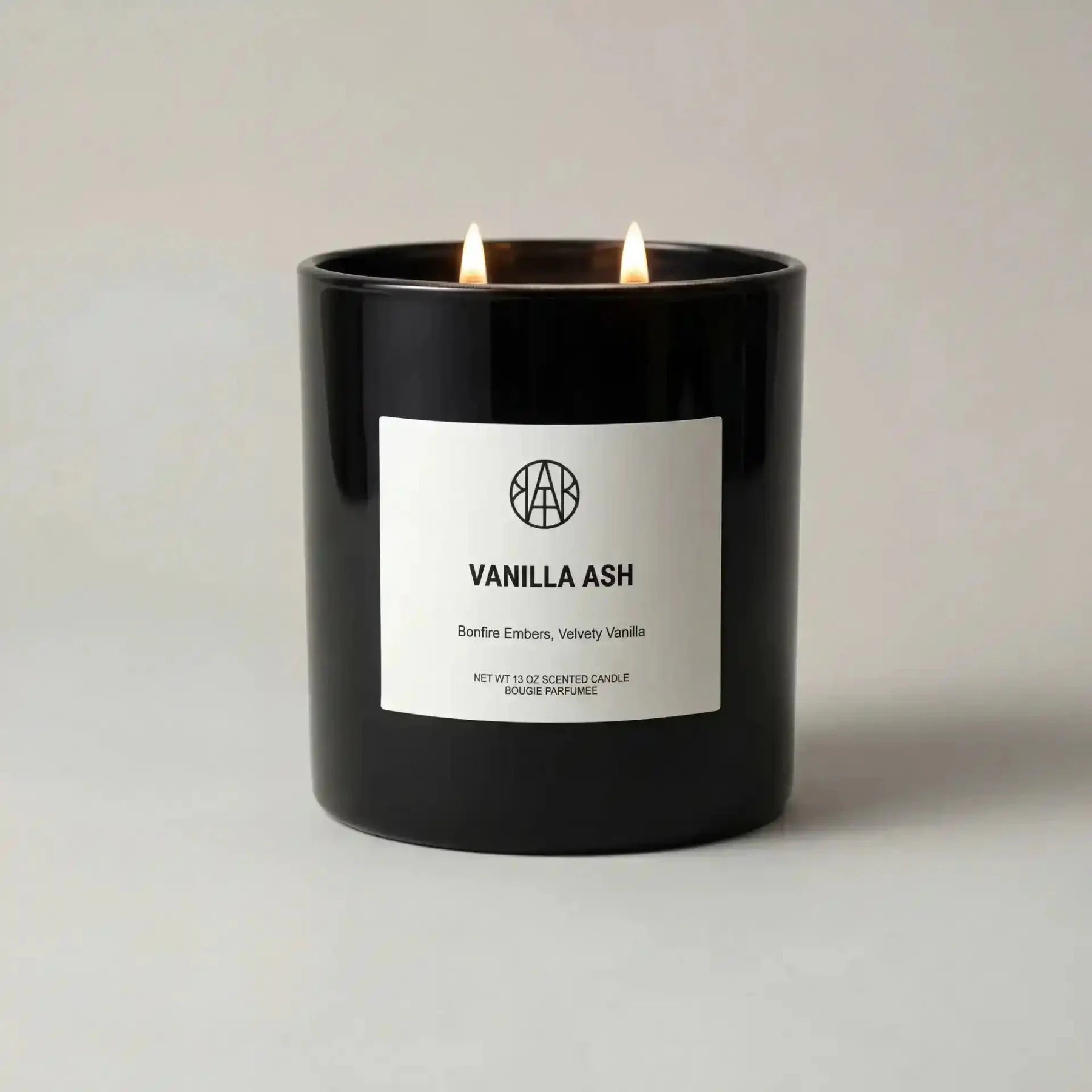 AEMBR Vanilla Ash Candle with a sleek white wax design and minimalist packaging, perfect for relaxing ambiance.
