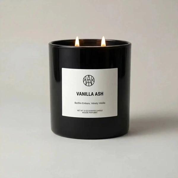 AEMBR Vanilla Ash Candle with a sleek white wax design and minimalist packaging, perfect for relaxing ambiance.