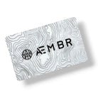 AEMBR physical gift card, $25 denomination, featuring the AEMBR brand logo and a sleek design on a white background.
