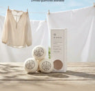 AEMBR dryer balls welcome gift set with soft, reusable wool dryer balls on a white background.
