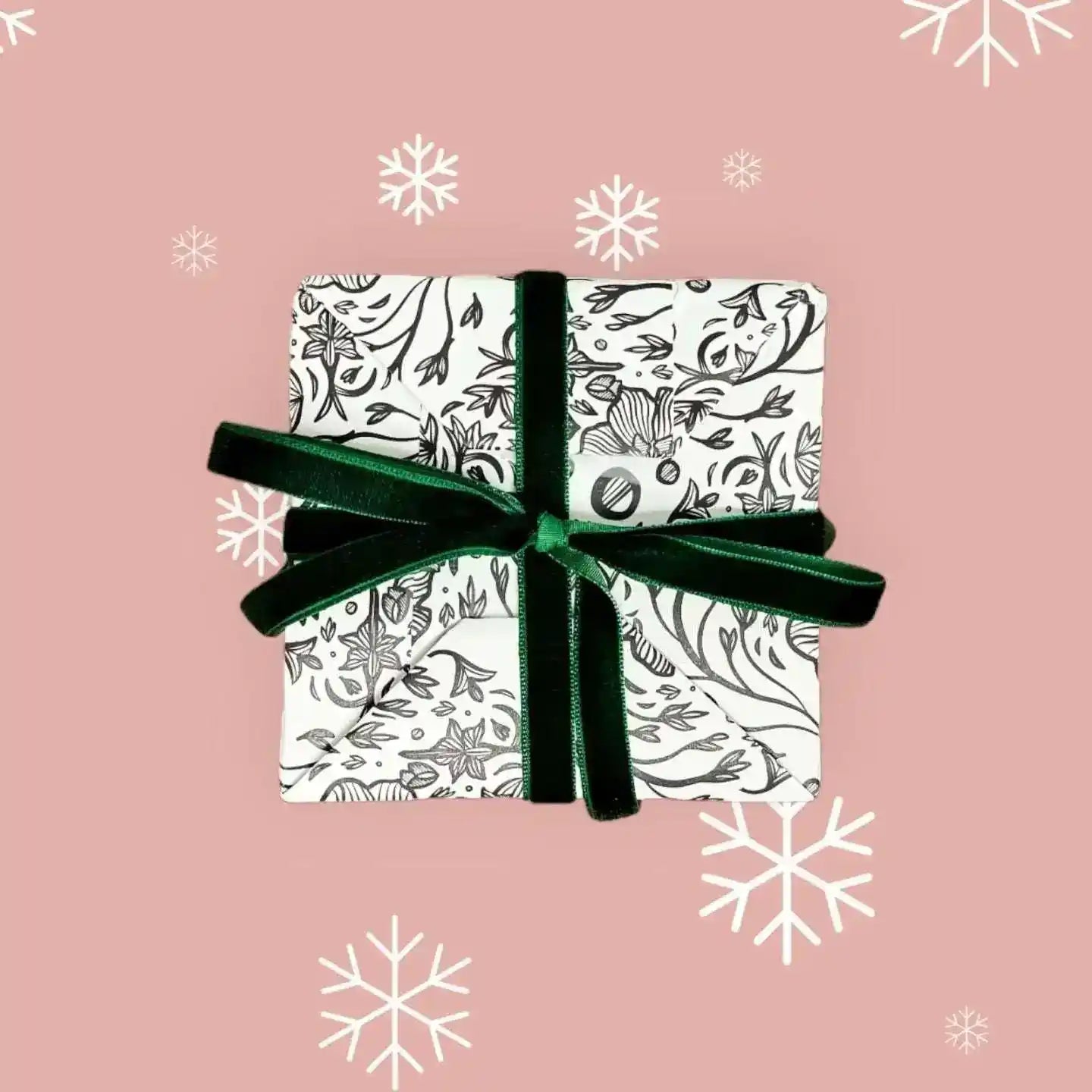 AEMBR gift wrap, hidden product packaging with elegant design, shown in a clean, folded presentation for gift wrapping.