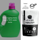 AEMBR laundry detergent powder bundle with scented sampler packs, showcasing the colorful packaging and product details.