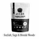 AEMBR luxury laundry gift set including detergent and fabric softener bottles in sea salt, sage, blonde woods scents.