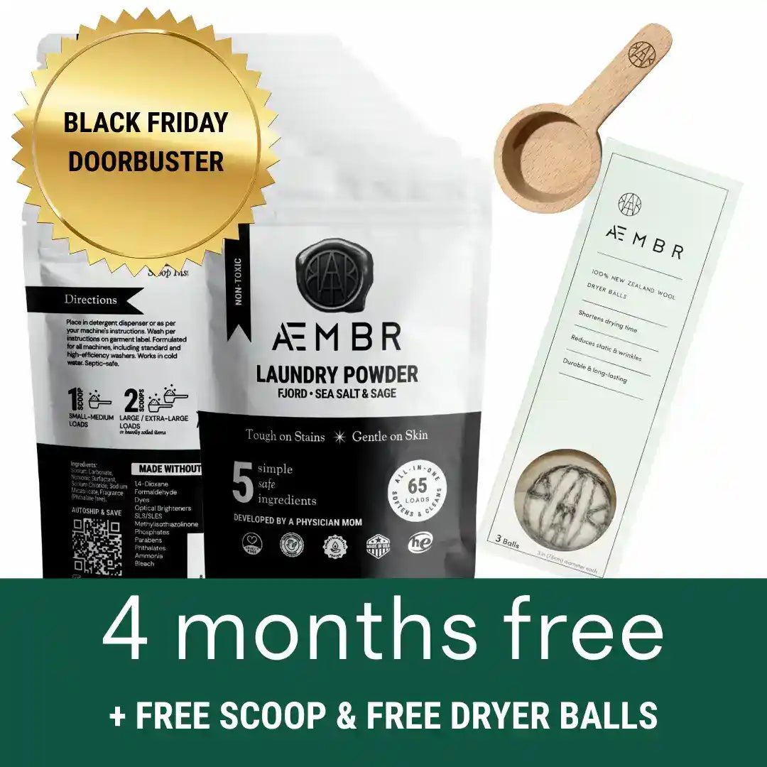 Non-toxic laundry detergent powder, wooden scoop, and wool dryer balls bundle with Black Friday offer.