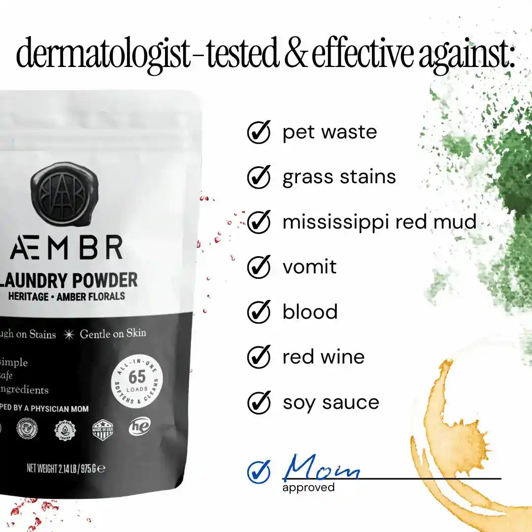Non-toxic laundry powder packaging with stain checklist including red wine, blood, grass, pet waste, dermatologist-tested.