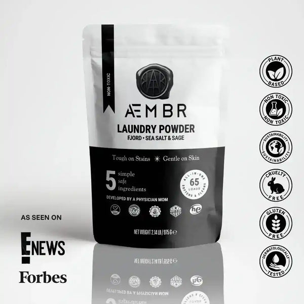 AEMBR laundry detergent powder in a bag with fresh sea salt, sage, and blonde woods scent, designed for effective laundry cleaning.