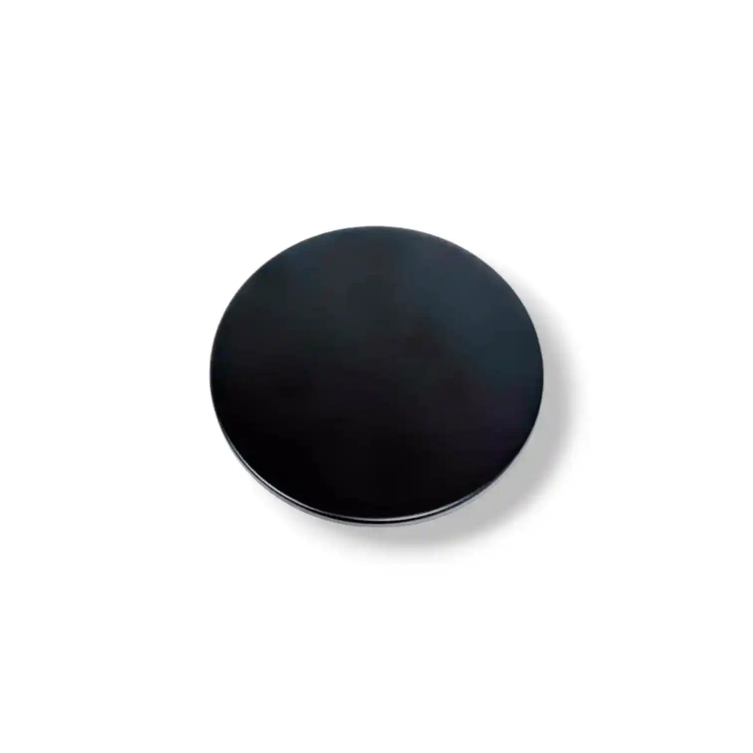 Glossy black deluxe candle lid by AEMBR, featuring a smooth, reflective finish designed to fit standard candle jars.