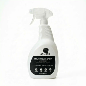 AEMBR Multi Surface Spray bottle with a spray nozzle, designed for cleaning various household surfaces.