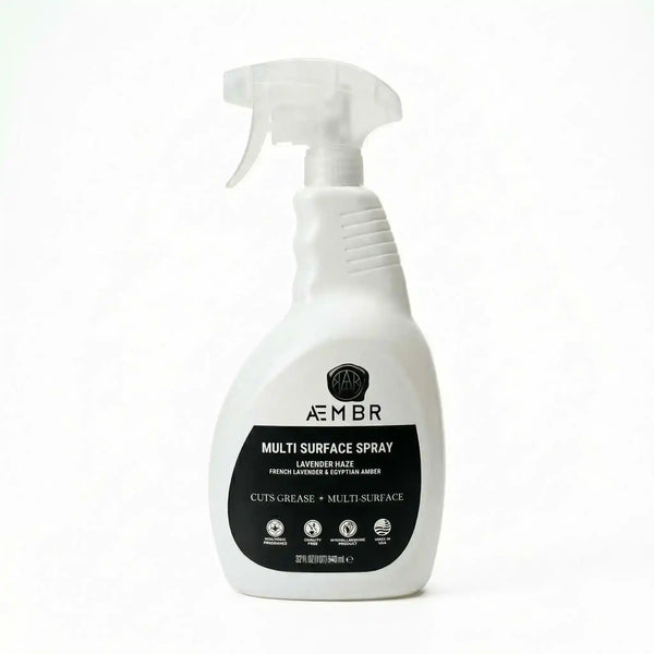 AEMBR Multi Surface Spray bottle with a spray nozzle, designed for cleaning various household surfaces.