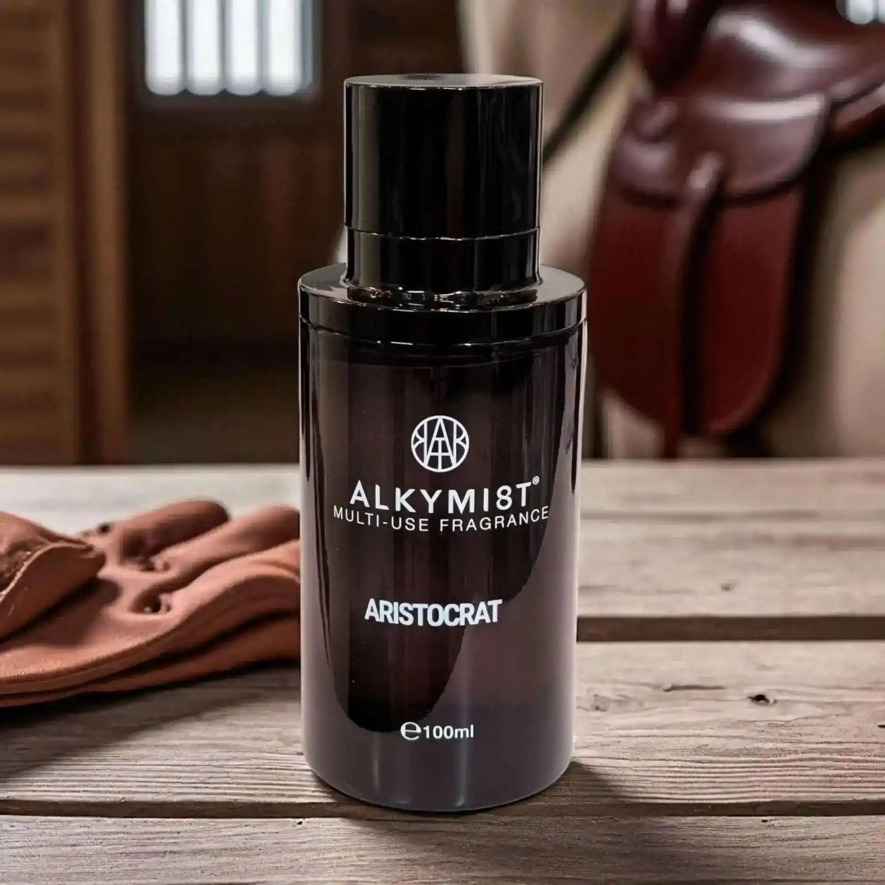 AEMBR ALKYMIST Luxe Aristocrat multi-use fragrance bottle with elegant packaging and branding.