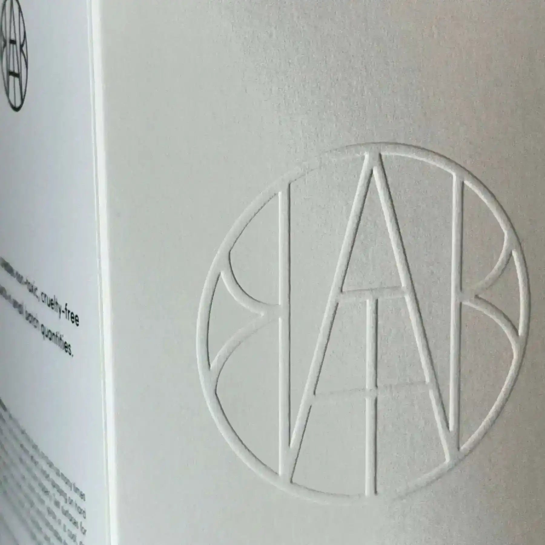 AEMBR ALKYMIST® Luxe Aristocrat multi-use fragrance bottle with elegant packaging and branding.