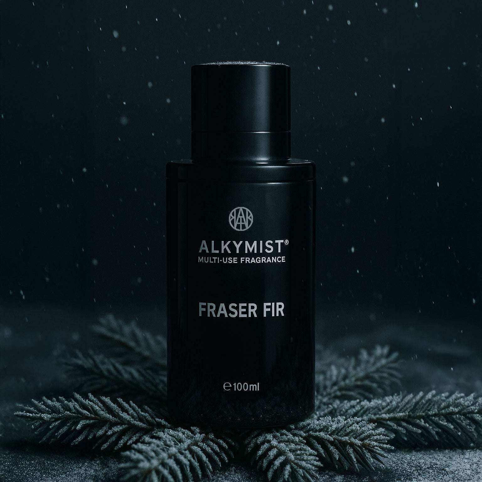 AEMBR ALKYMIST® Luxe Fraser Fir multi-use fragrance bottle with a sleek design and festive green label.