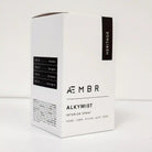 AEMBR ALKYMIST® Luxe Heritage multi-use fragrance bottle with elegant label and cap, set against a neutral background.