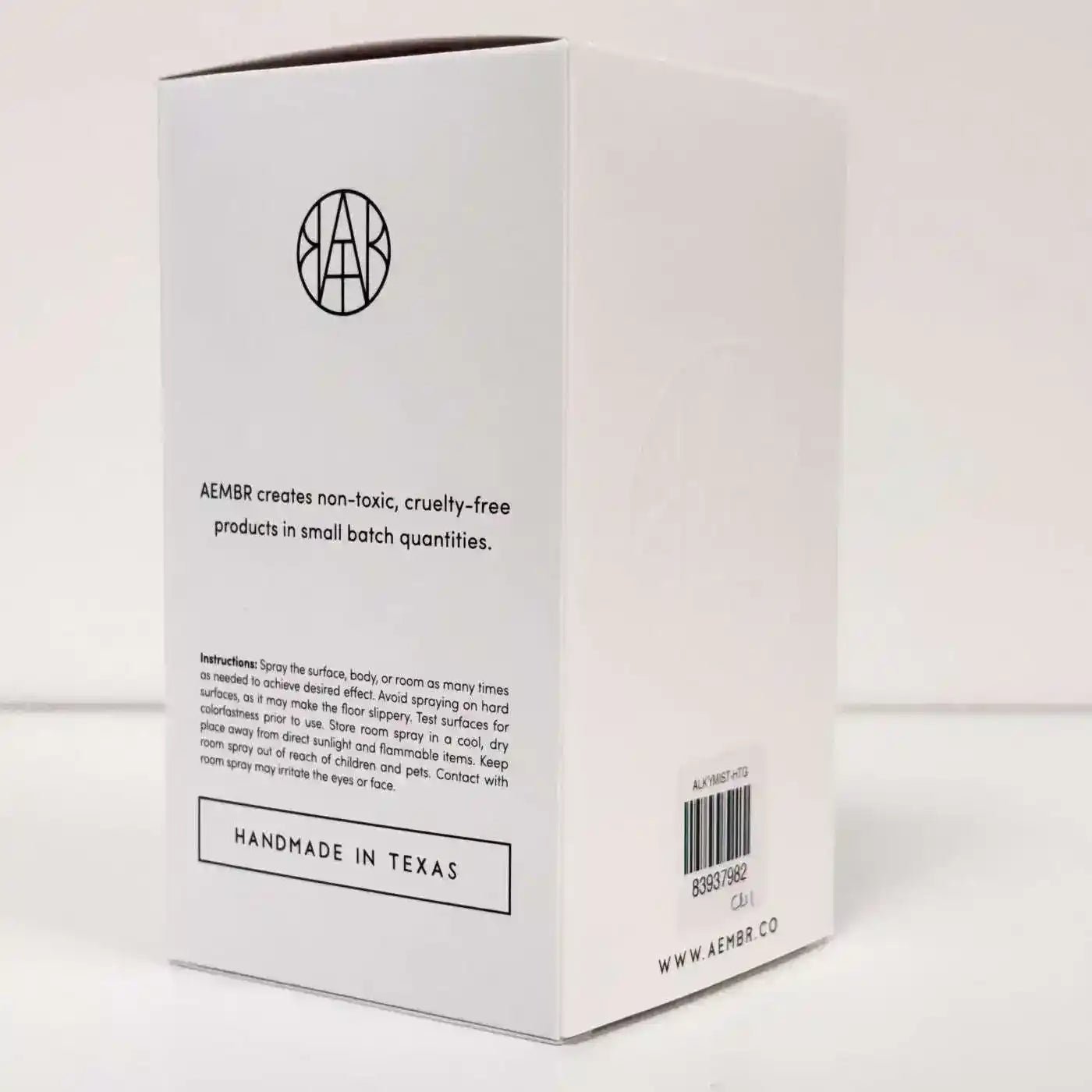 AEMBR ALKYMIST® Luxe Heritage multi-use fragrance bottle with elegant gold accents, showcasing a luxurious and sophisticated design.