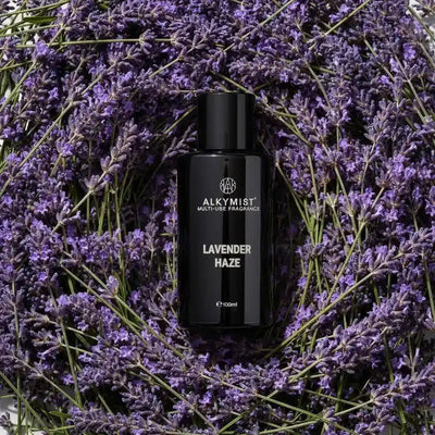 AEMBR ALKYMIST® Luxe Lavender Haze multi-use fragrance bottle with elegant label design and lavender accents.