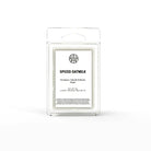AEMBR Spiced Oatmilk Wax Melts in a clear plastic container, showcasing the warm, creamy scent with a hint of spice.