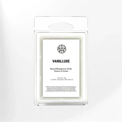 AEMBR Vanilluxe wax melts in a clear plastic container with vanilla scent, designed for aromatherapy and home fragrance.