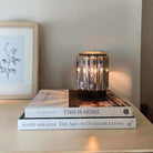 AEMBR Deco Wax Warmer displaying a stylish ceramic design with a lit tealight inside, perfect for home fragrance.