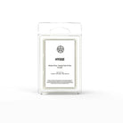 AEMBR Hygge Wax Melts in a warm, cozy setting with a wax warmer and winter-themed bundle of scented wax melts.