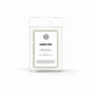 AEMBR Amber Oud luxury coconut wax melts in clear clamshell packaging, front label visible