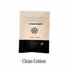 AEMBR Between the Sheets Clean Cotton laundry powder sample in minimalist pouch packaging