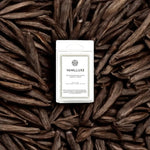 AEMBR Vanilluxe wax melt package on Madagascar vanilla beans, non-toxic home fragrance.