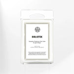 BIBLIOTEK coconut wax melts in clear packaging with opopanax, rosewood, and tonka scent by AEMBR.
