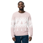 Man wearing a light pink sweater with white patterns on a white background