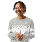 Smiling woman wearing AEMBR classic fit knitted crew neck sweater with winter pattern