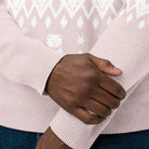 AEMBR classic-fit knitted crew neck sweater with white geometric pattern, close-up of cuffs