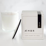 AEMBR luxury coconut wax candle with black lid and branded box, double wick, minimalist design
