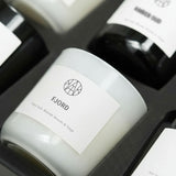 Set of candles with labels on a black background