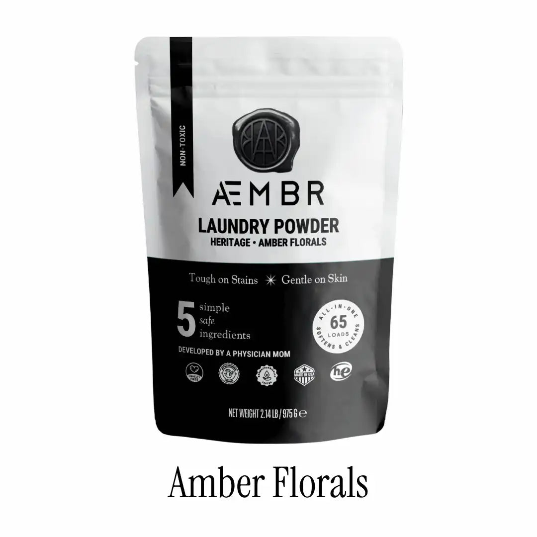 AEMBR Amber Florals laundry powder pouch, non-toxic, for 65 loads, on white background