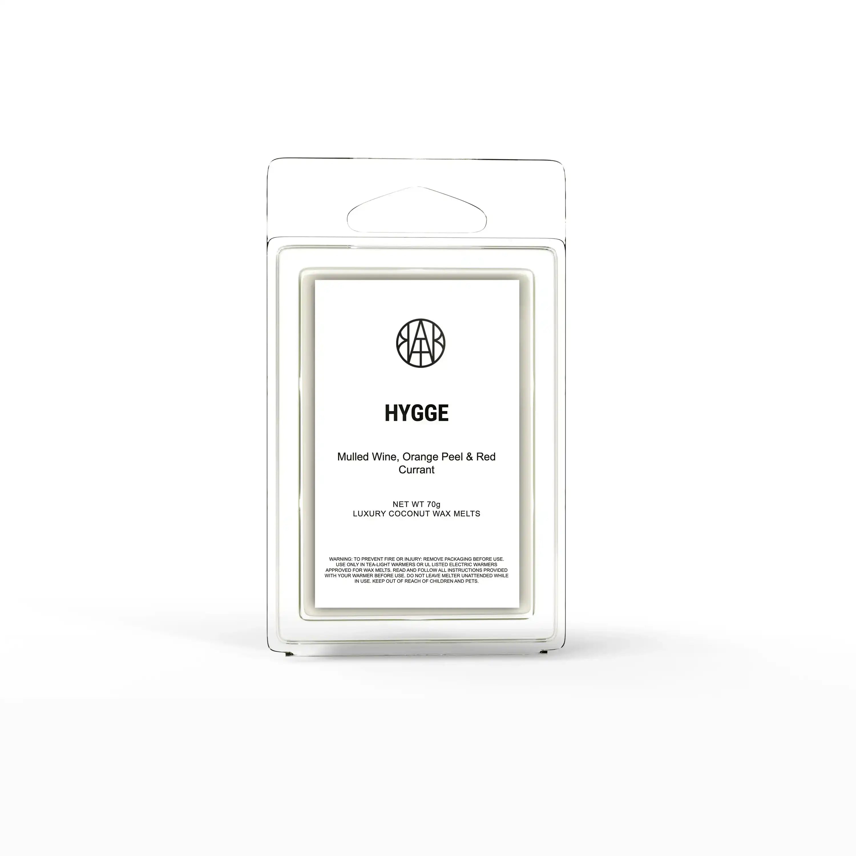 AEMBR Hygge coconut wax melts in clear packaging, labeled with mulled wine, orange peel, and red currant scent.