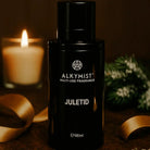AEMBR ALKYMIST Juletid multi-use fragrance bottle with candle and ribbon, festive setting