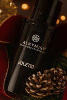 AEMBR ALKYMIST Juletid multi-use fragrance bottle with pine cones and festive decor